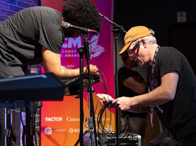 Premier Live Audio engineer patching the stage at the East Coast Music Awards