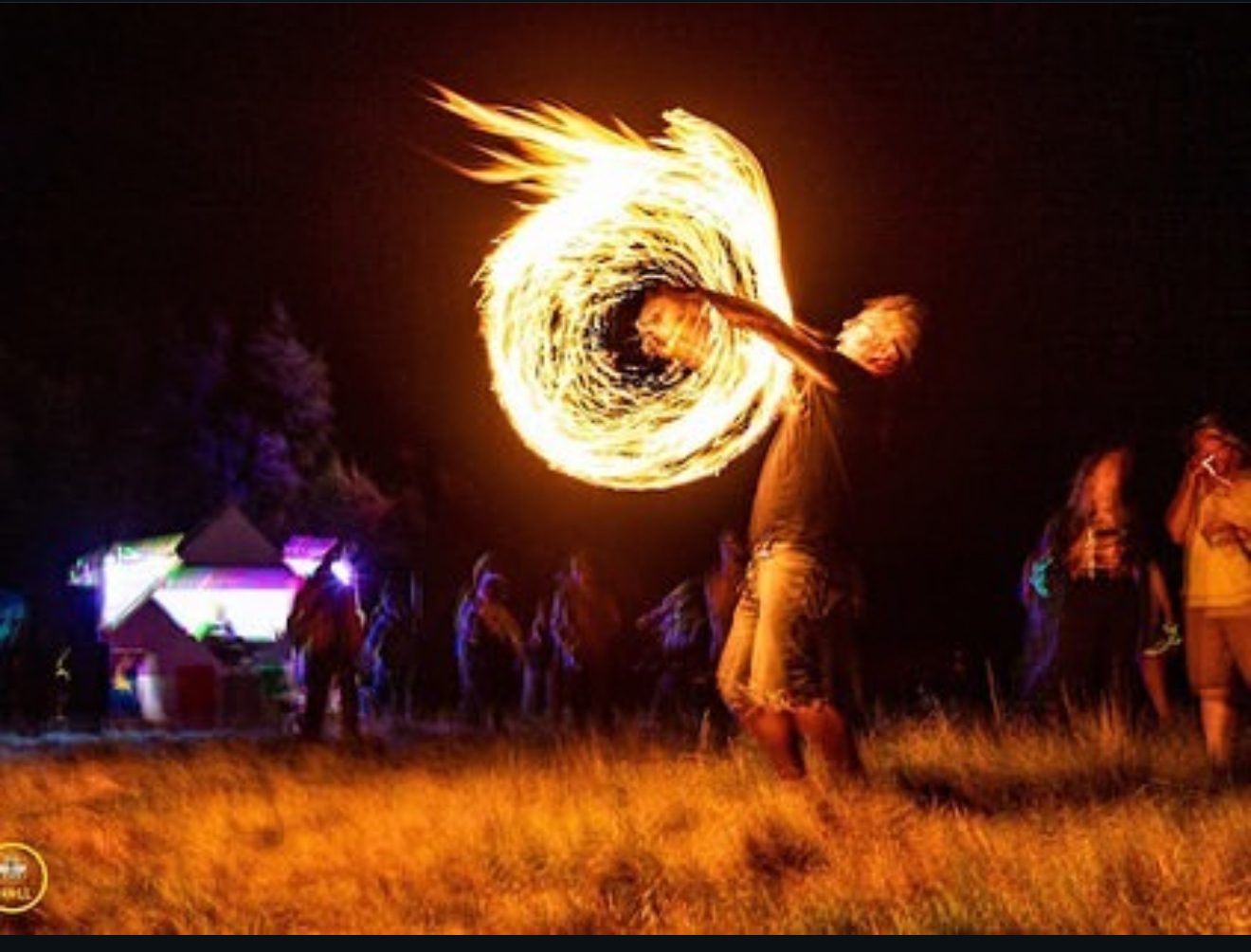 Fire poi demonstration — golden spiral of flame
